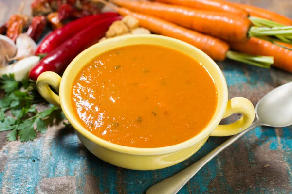 Spicy carrot soup with harissa made from hot chili pepper, lemon — Stock Photo, Image