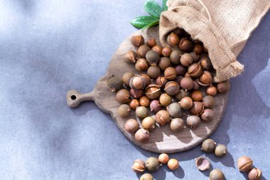 Unpeeld taze hasat Avustralya macadamia fıstığı, yakın çekim