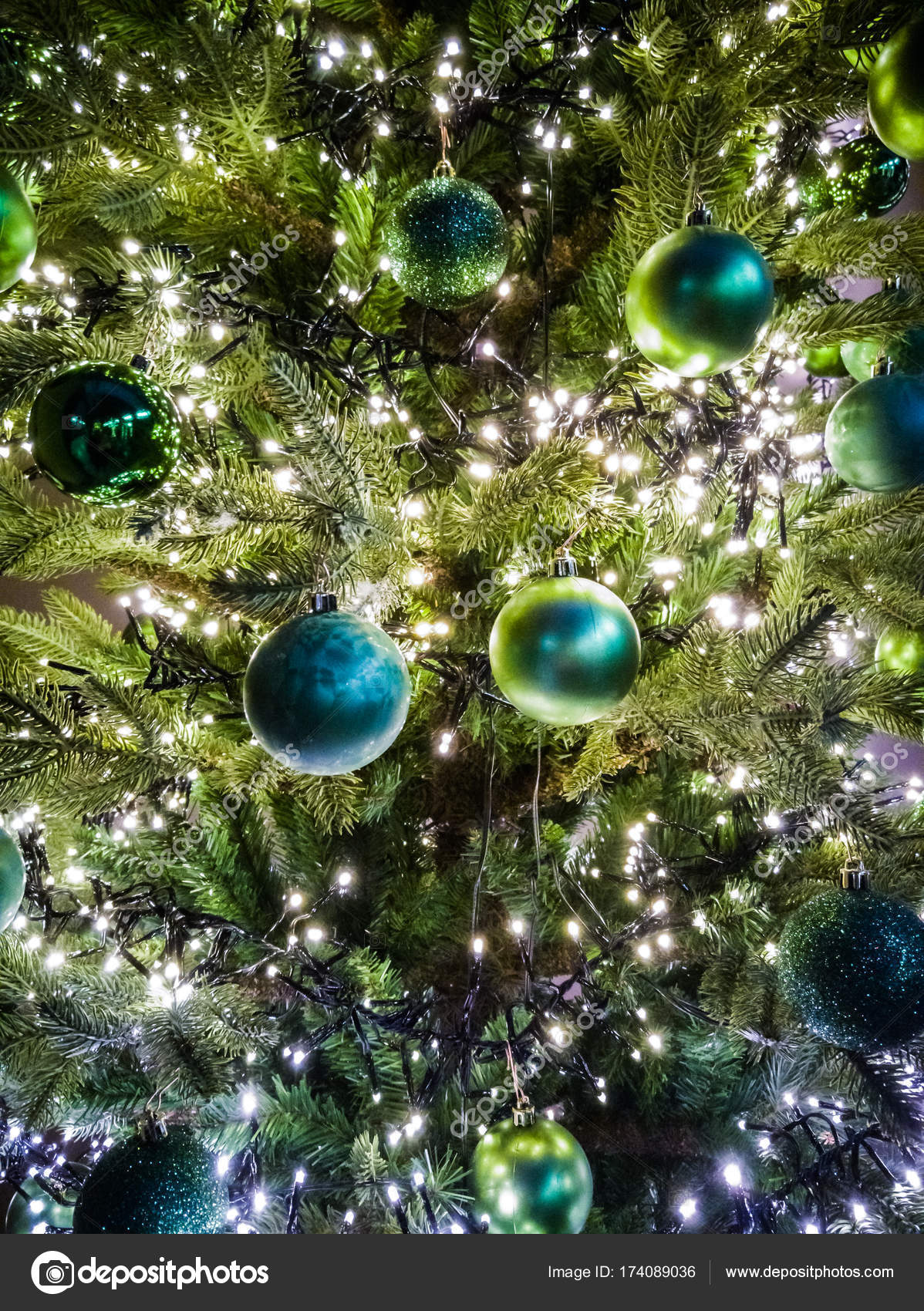 Traditional Decorated Christmas Tree In Green Colors With Green Stock Traditional Decorated Christmas Tree In Green Colors With Green Stock
