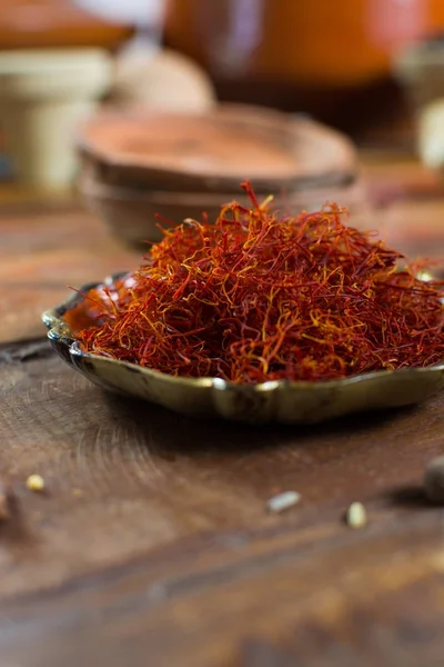 Real red dried saffron spice, tasty ingredient for many dishes, close up