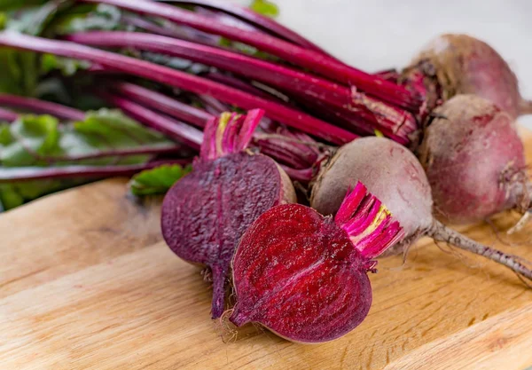 Young raw red beets roots with leaves, new harvest