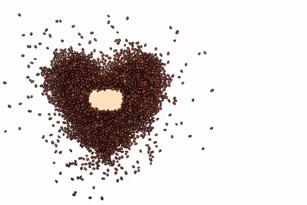 Кофейные Зерна Разбросаны Форме Сердца Белом Фоне Кофе Абстракции Кофейных — стоковое фото