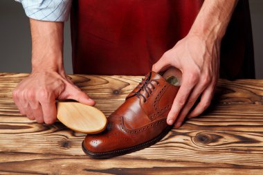 Four toes one on one of brown shoes (brogues and derby)  clipart