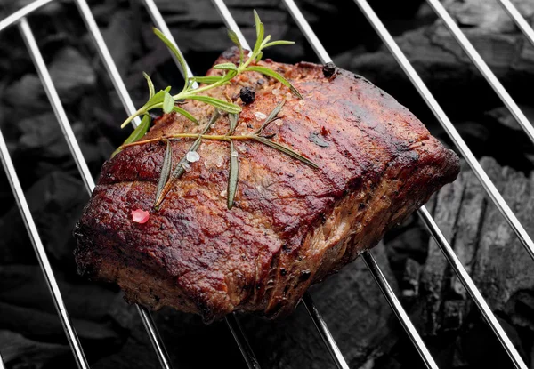 Beef steaks on the grill — Stock Photo, Image