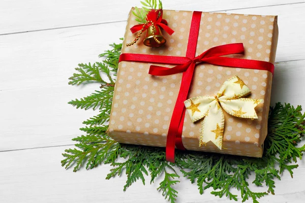 Rustic gift christmas box.Copy space.Wooden background.Bells.Space for your text — Stock Photo, Image