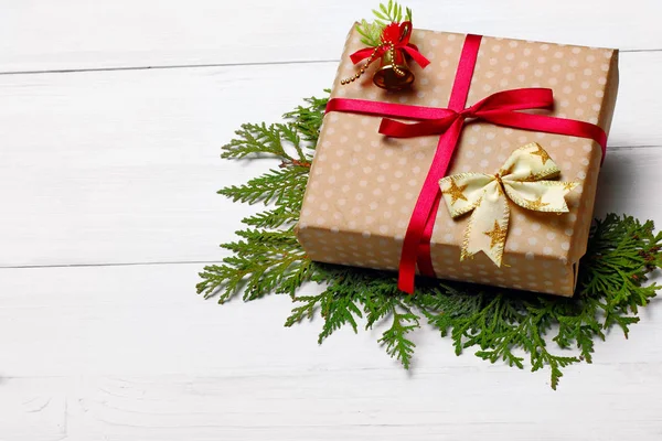 Rustic gift christmas box.Copy space.Wooden background.Bells.Space for your text — Stock Photo, Image