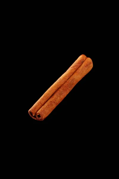 Cinnamon sticks isolated on a black background — Stock Photo, Image