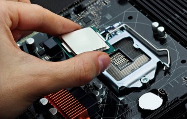 Cpu işlemci anakart soketine takın. Teknolojik arka plan. Konsept bilgisayarlar harware