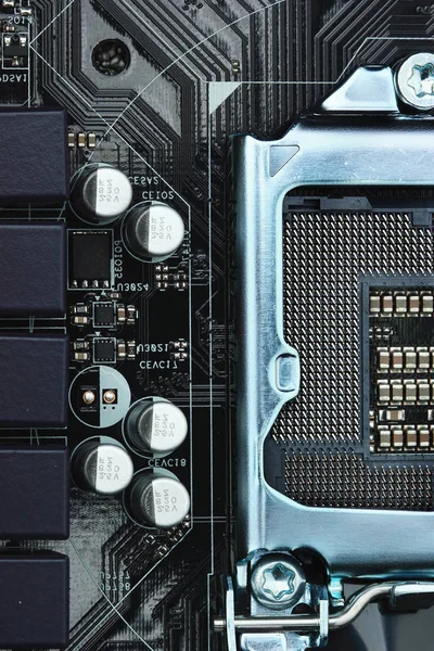CPU işlemci yuvasının pinleri görünür ile bir bilgisayar anakart üzerinde boş. CPU işlemci yuvasının pinleri görünür ile bir bilgisayar anakart üzerinde boş. Kavram bilgisayar harware — Stok fotoğraf