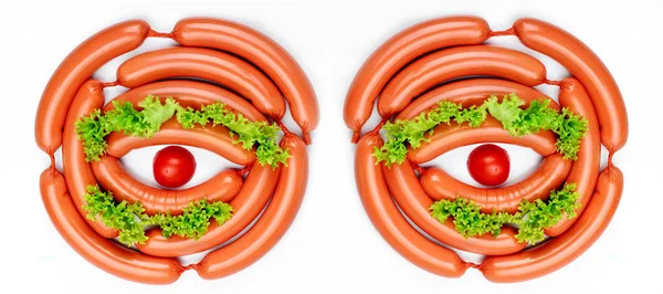 Eye symbol represented by sausages in the shape of eye, salads lashes,pupils mini pumpkin.Concept food art — Stock Photo, Image