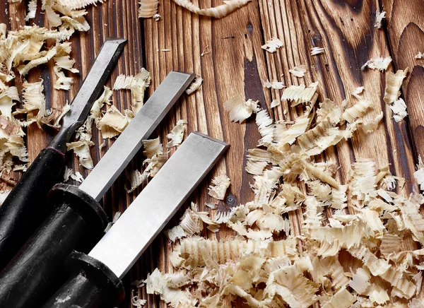 Woodworking tools. Chisel with sawdust .copy space.horizontal shot