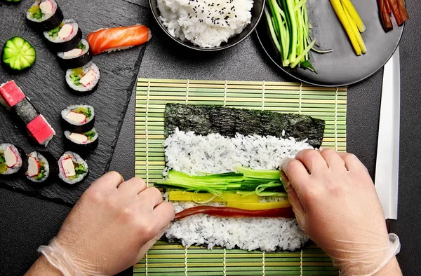 The process of making sushi and rolls, top view — Stock Photo, Image