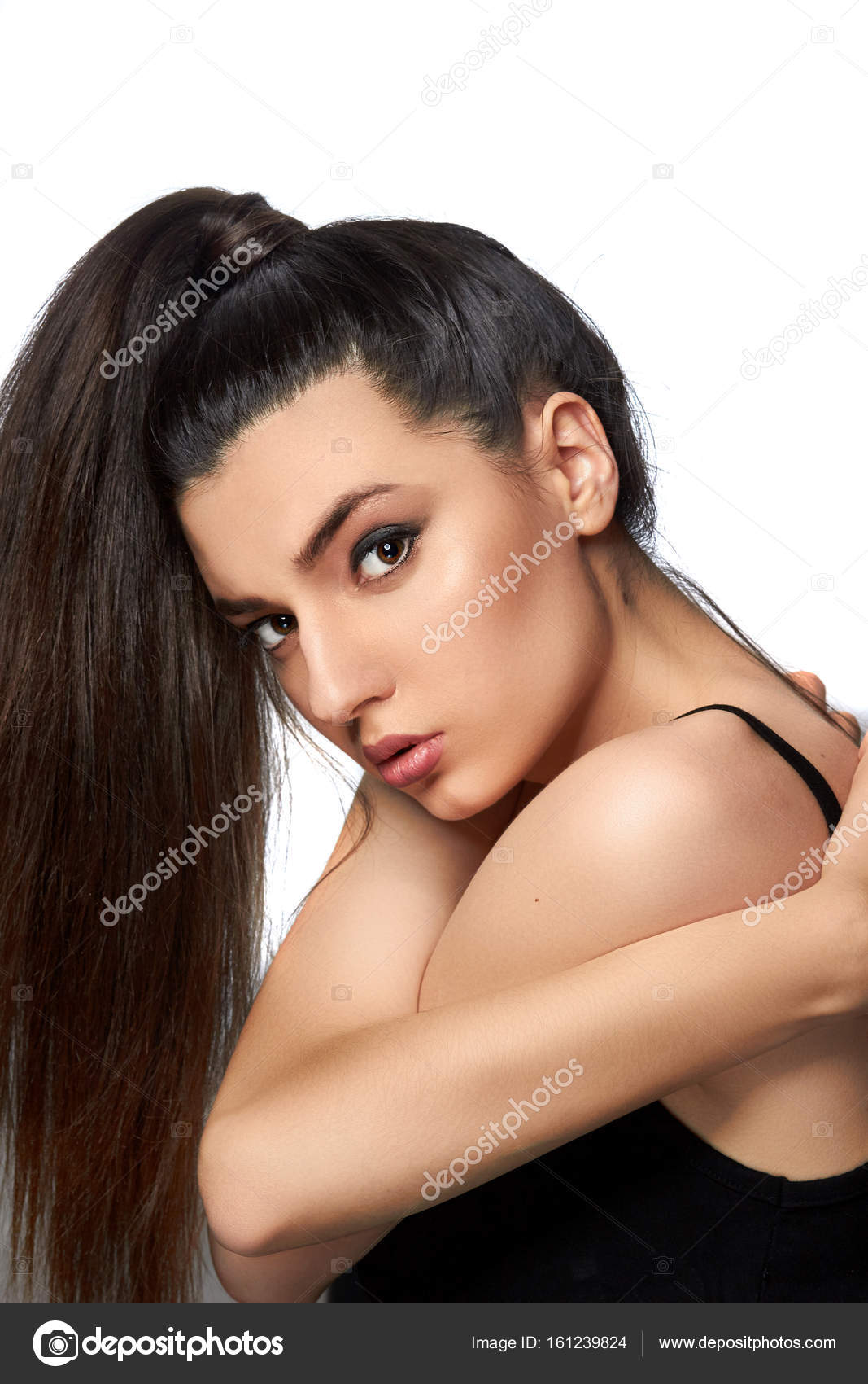 Fashion Portrait Of Beautiful Young Woman With Ponytail