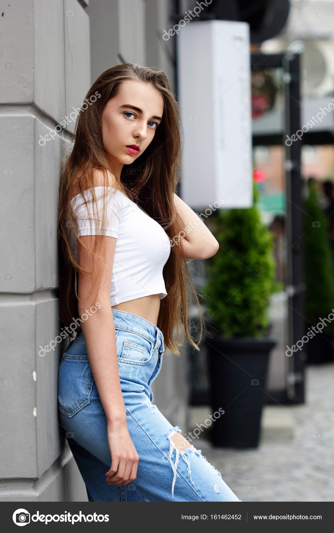 girl wearing jeans and top