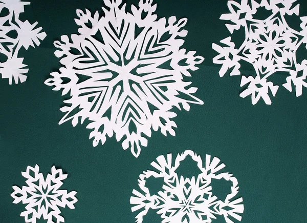 Winter style background.Paper snow flakes on cyan background — Stock Photo, Image