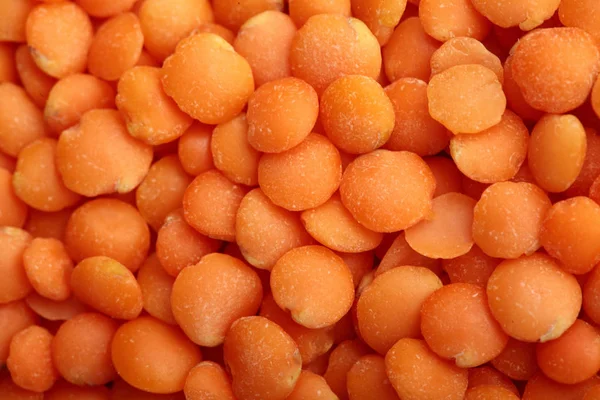 Orange lentils close-up .Texture .Selective focus.Red lentils — стоковое фото