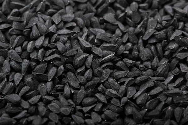 Kalonji Black cumin seeds. Texture of black cumin. — стоковое фото