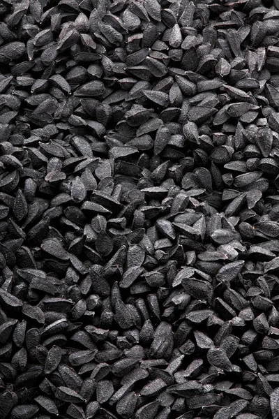Kalonji Черный тмин seeds.Texture черного cumin.Full глубина focus.Top вид — стоковое фото