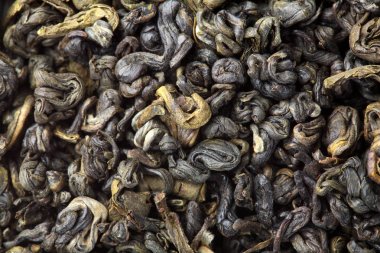 Yeşil çay doku. Closeup.Macro vurdu. Kuru yeşil çay yığını.