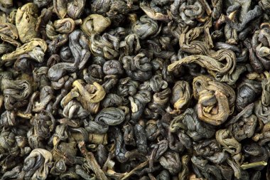 Yeşil çay doku. Closeup.Macro vurdu. Kuru yeşil çay yığını.