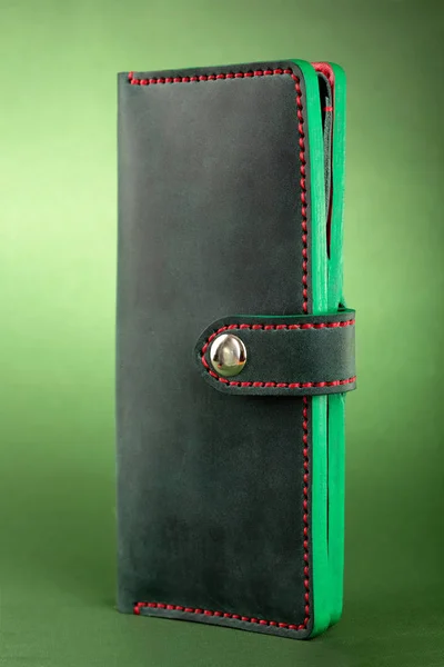 One purse,clutch genuine leather.Women handbags green on green background