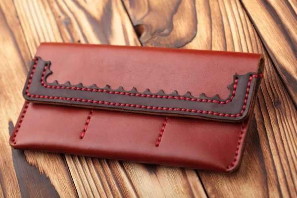 Brown leather wallet.Genuine leather craft object with tool using for wallet.DIY tools.Hand crafted wallet
