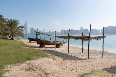 View to Abu Dhabi skyline from the beach, United Arab Emirates clipart