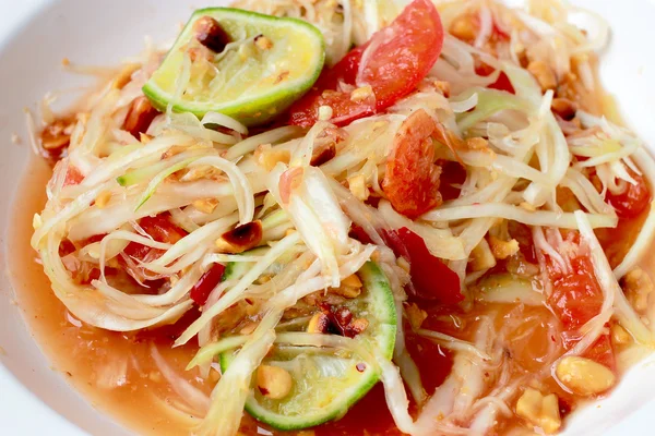 Green Papaya Salad (Som tum Thai) on table. Thai cuisine spicy delicious. — Stock Photo, Image