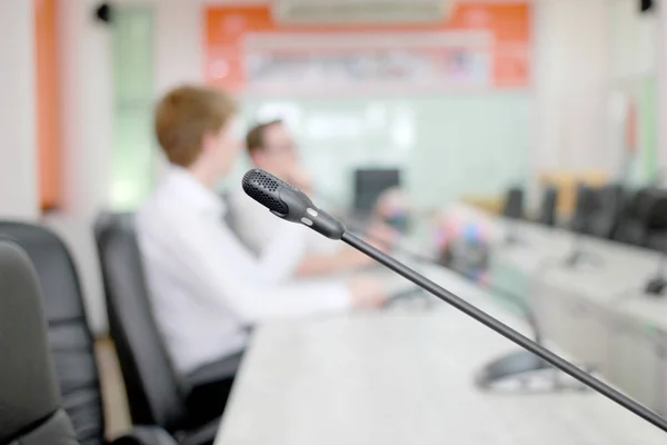Microphone soft focus on blur abstract background lecture hall/ seminar meeting room in business event/ educational academic classroom training course: Speaker / teacher's mic in college class room