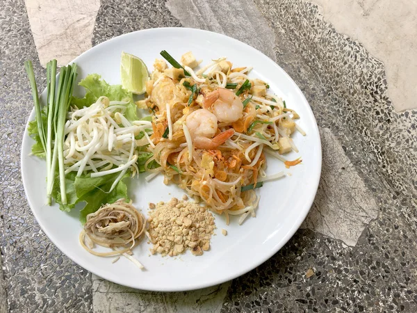 Fried noodle Thai style with prawns, Stir fry noodles with shrimp in Pad Thai , Thai noodle style, Traditional food.