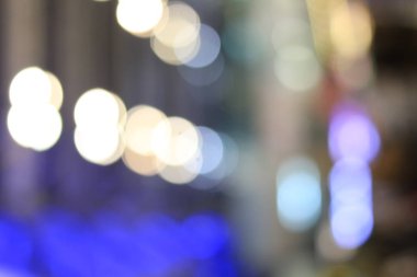 Soyut dairesel Bokeh hareket lensleri şehir ve sokak lambası veya gece vakti Bokeh ışığı. Bangkok Otoyolu Tayland.