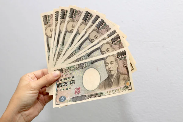 Mano Sostiene Una Moneda Japonesa 10000 Billete Yen Una Cartera — Foto de Stock