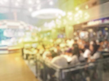 Fast food kavramı. İnsanlar yeme blurred. Vintage rengi.