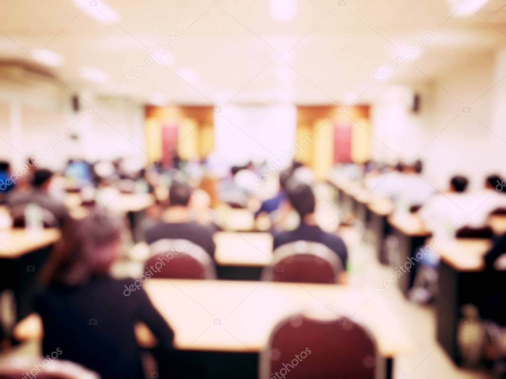 Abstract blur education meeting, business, student and people in classroom in university. teacher lecture meeting group background.