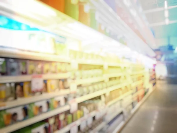 Suddig bild av människor shopping i på järnaffär eller förrådshus med mängd inomhus & utomhus takfläkt, flushmount, infällda, track lights, led. Vintage ton med ljuseffekt. — Stockfoto