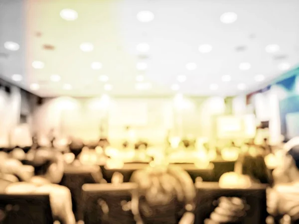Education concept, Abstract blurred background image of students and business people studying and discuss in large hall profession seminar with screen and projector for showing information. — Stock Image Education Concept Abstract Blurred Background Image Students Business People Studying Stock Picture