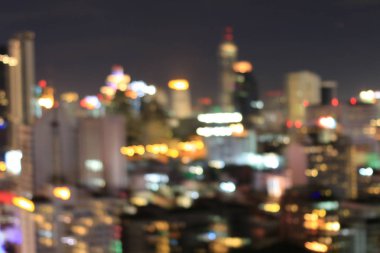 Soyut dairesel Bokeh hareket lensleri şehir ve sokak lambası veya gece vakti Bokeh ışığı. Bangkok Otoyolu Tayland.
