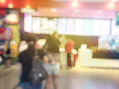Fast food kavramı. İnsanlar yeme blurred. Vintage rengi.