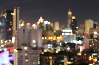 Soyut dairesel Bokeh hareket lensleri şehir ve sokak lambası veya gece vakti Bokeh ışığı. Bangkok Otoyolu Tayland.