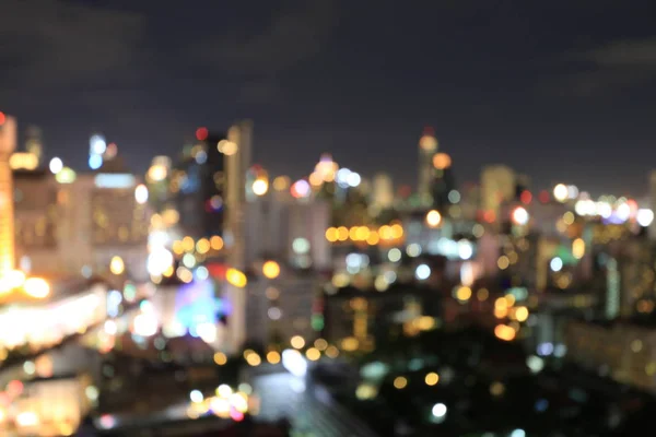 Abstrakcyjny okrągły bokeh obiektyw ruchu rozmycia zaplecza miasta i ulicy światła lub Bokeh światła z samochodu na ulicy w nocy. Bangkok Expressway Tajlandia. — Zdjęcie stockowe