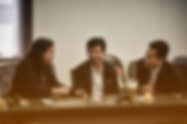 blurred image of board of Directors, education people, business team, employees, young colleagues sitting in conference room or meeting room in the office for group discussion and brainstorming.