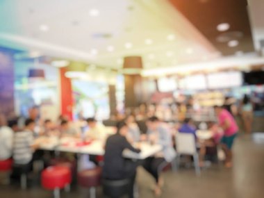 Fast food kavramı. İnsanlar yeme blurred. Vintage rengi.