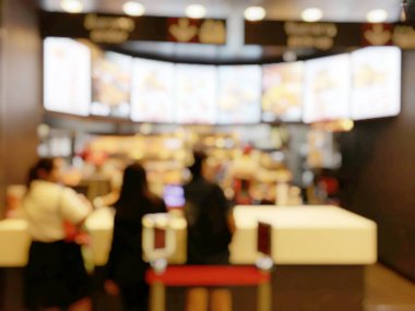 Fast food kavramı. İnsanlar yeme blurred. Vintage rengi.