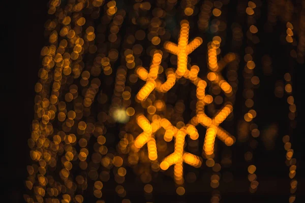 Fundo borrado de iluminação de Natal laranja — Fotografia de Stock