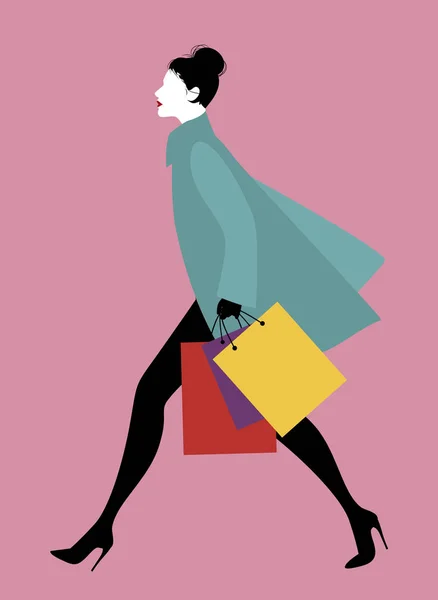 Mulher elegante com sacos de compras andando na rua . — Vetor de Stock
