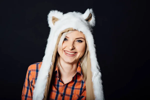 Beautiful sexy girl wearing white fur hat — Stock Photo, Image