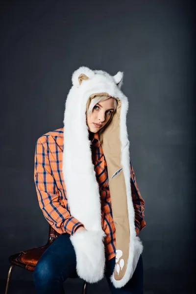 Beautiful sexy girl wearing white fur hat — Stock Photo, Image