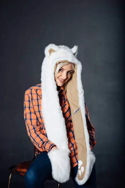 Beautiful sexy girl wearing white fur hat — Stock Photo, Image