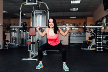 Güzel fitness kadın kaldırma halter.