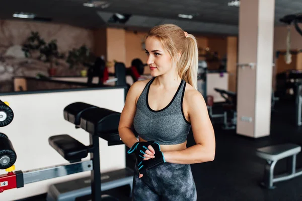 Close up portrait of fitness young woman